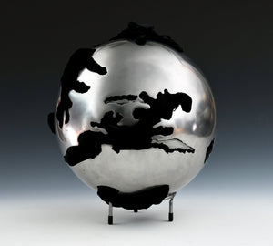 Steel Sphere with Velvet Fabric  Diameter: 12" (30 cm) - Thickness: 1/8" (3 mm)  Fabric: Velvet - black  Steel is layered 1 depth below the surface in a few areas  Style: Enclosed  Weight 16 lbs (7 kg)